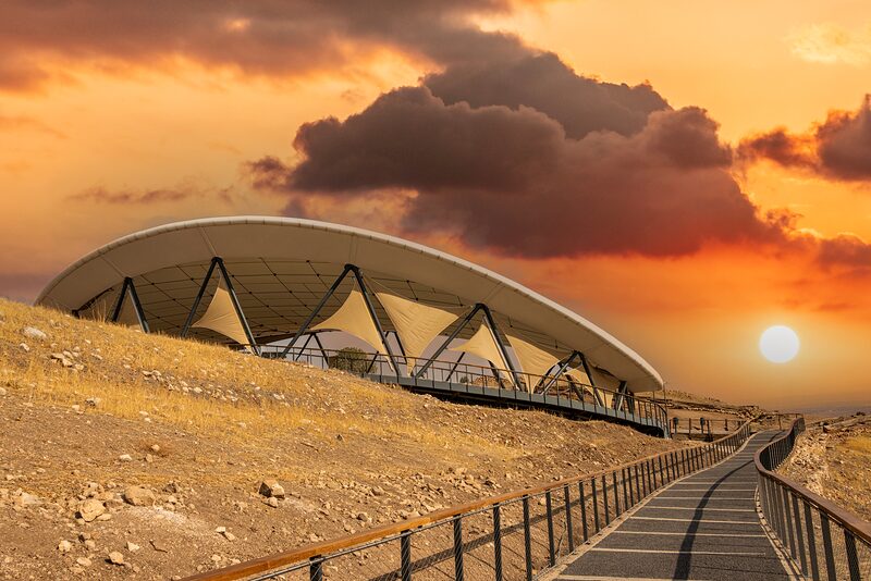 The protective canopy and the visitor boardwalk at sunset