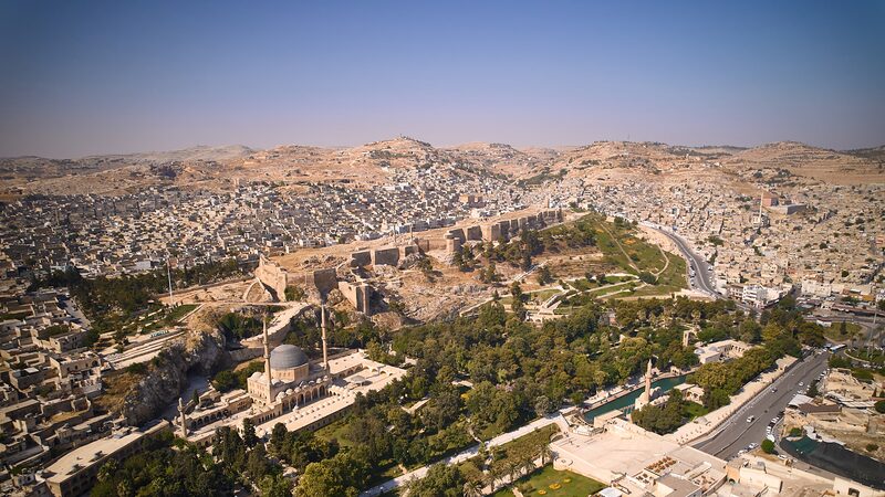 Şanlıurfa from above, the old city gathered around Balıklıgöl